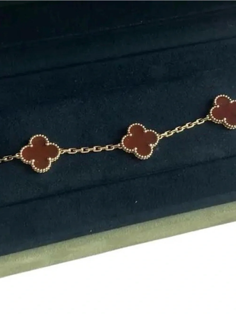 Van Cleef & Arpels Gold Bracelet with Deep Red Alhambra Motifs